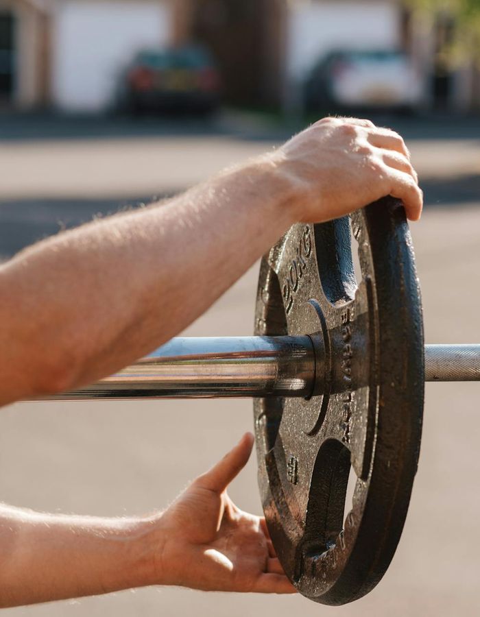 Active man performing physical exercises for stamina